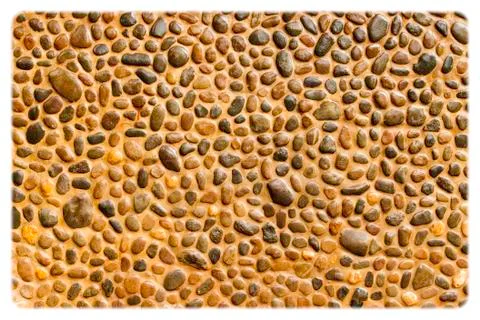 Pebble wall texture Stock Photos