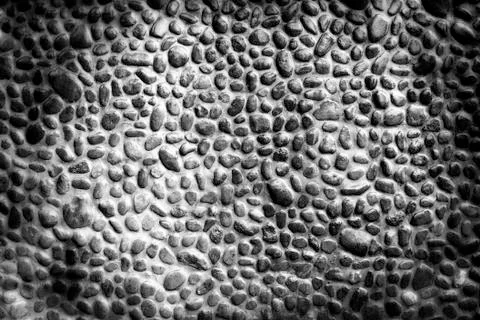 Pebble wall texture Stock Photos