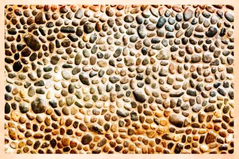 Pebble wall texture Stock Photos