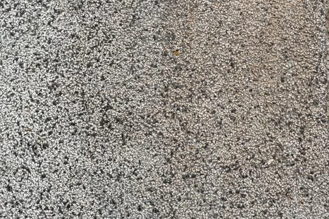Pebble wall texture small stone detail sharp copy space for text background Foto stock