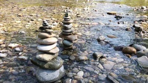 Pebble Zen balanced  rock stone with clean crystal water flowing. Stock Footage 139458003