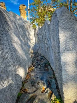 Pebbled Path Winds Between Soaring White Stone Walls Ephesus Stock-Fotos