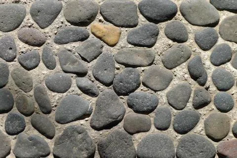 Pebbled stone floor Stock Photos