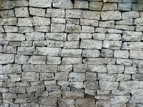 Pebbled stone wall texture Stock Photos