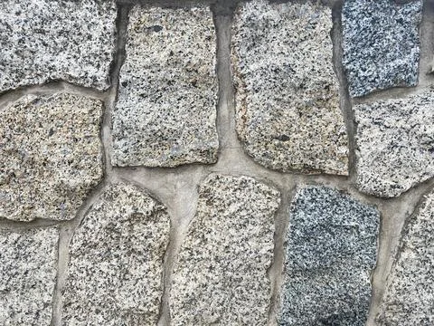 Pebbled stone wall texture Stock Photos