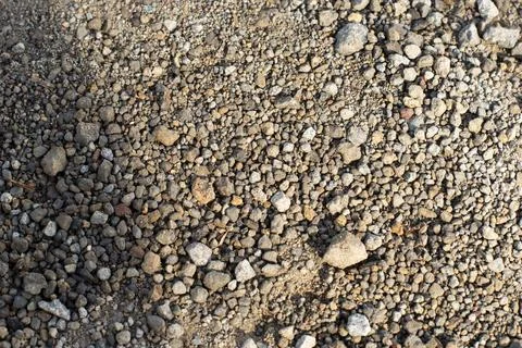 Pebbles adorn the courtyard, Background image of gravel rocks. Photos