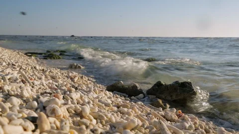 The pebbles and the ocean Stock Footage 107264213