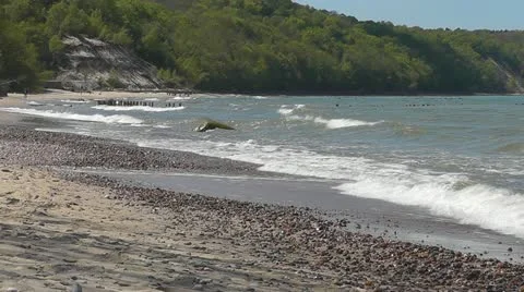 Pebbles and sea surf Stock Footage