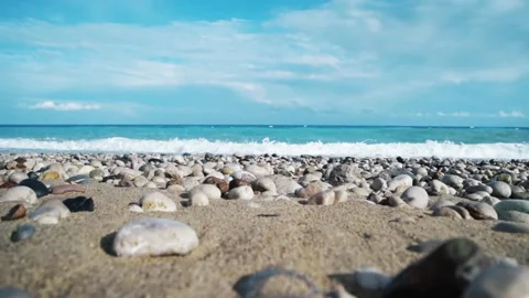 Pebbles and sea,slow motion Stock Footage 87214024