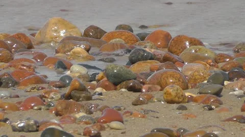 Pebbles and waves Video stock 11053681
