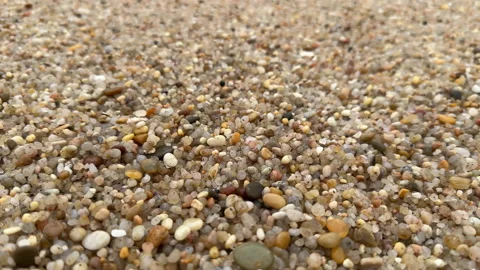 Pebbles on beach background Stock Footage 234352360