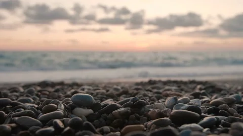 Pebbles On Beach At Sunset Vídeo Stock 169692330
