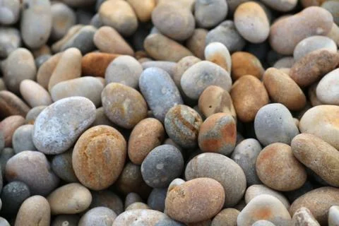 Pebbles on Chesil Beach, part of the Jurassic Coast in Weymouth, Dorset, England Stock Photos