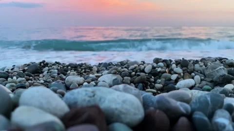 Pebbles close-up on the beach are washed by sea waves Stock Footage 264054729