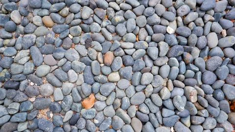 Pebbles That Form Irregular Solid Patterns Stock Photos