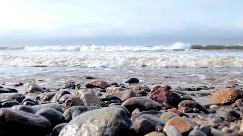 Pebbles hit by waves of Baltic Sea Stock Footage 92048296
