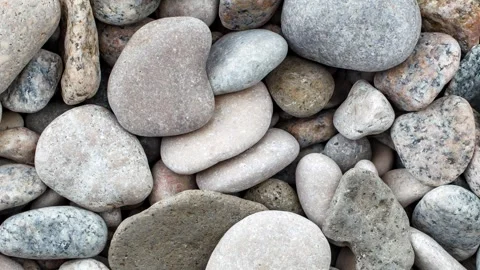 Pebbles, large round beach sea stones, moving sideways Video stock 255034041