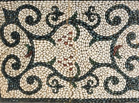 Pebbles mosaic symbol pattern Stock Photos