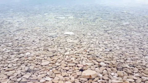 Pebbles in the sea Video stock 88537667