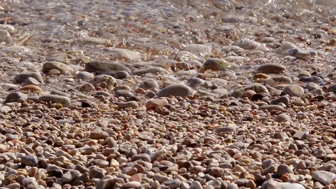 Pebbles in the sea with macro shoot Stock Footage 119758185