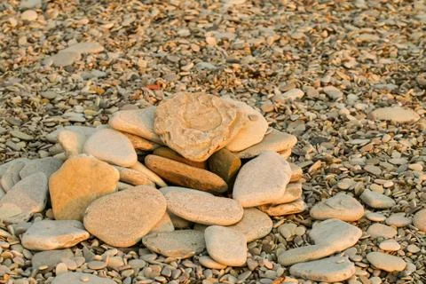 Pebbles on seashore. Stock Photos