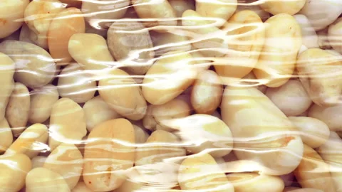 Pebbles stone under rippled water surface. Vídeo Stock 165283640