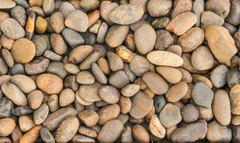 Pebbles texture background image. Stock Photos