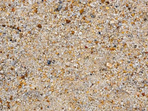 Pebbles texture background. Smooth and polished. Pebble on shingle beach. Col Stock Photos