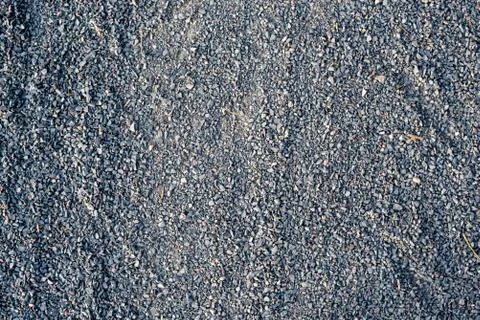 Pebbles throughout the frame - possible texture for design Stock Photos