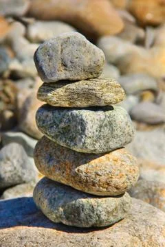 Pebbles tower in the river Stock Photos