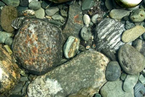 Pebbles under Water Stock Photos