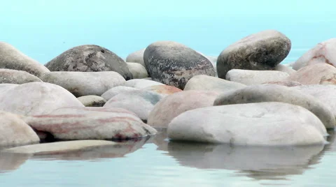 Pebbles in water Stock Footage 61546731