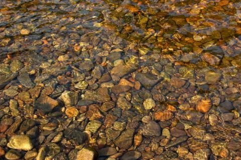 Pebbles in water Stockfoto's