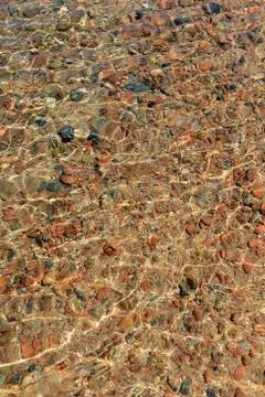 Pebbles in water Stock Photos