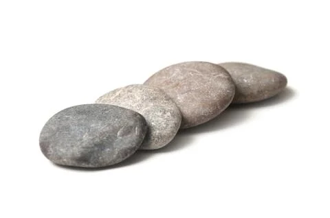 Pebbles on white background Stock Photos