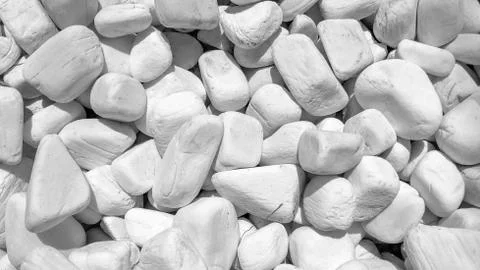 Pebbles in white. Stock Photos