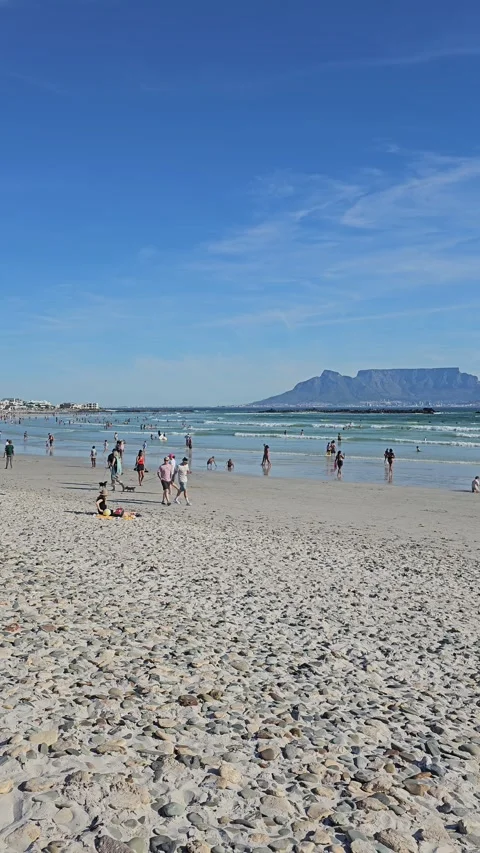 Pebbly Sand and Table Mountain, Bloubergstrand, Cape Town, South Africa Stock Footage 347960357