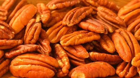 Pecan nuts background horizontal close-up hd. nuts pattern Stock Photos