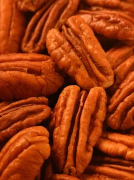 Pecan nuts background vertical close-up hd. Textured of nuts Stock-Fotos