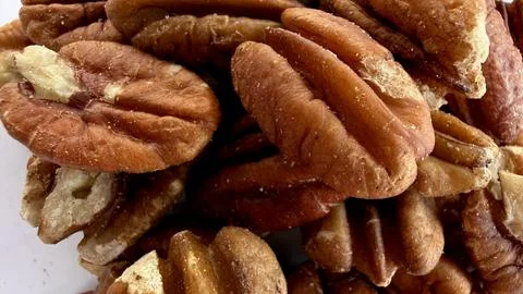 Pecan nuts close up texture background for food and ingredient use 写真素材