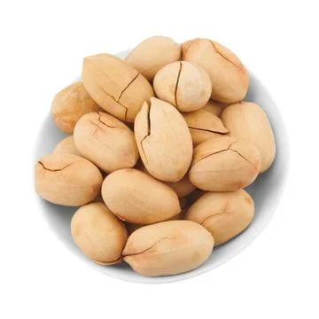 Pecan nuts in shell, in piala, isolated on a white background Stock Photos