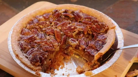 Pecan Pie or Chess Pie Cutting Slice Real Time Motion Roasted Nuts Fresh Pie Stock Footage 145874739