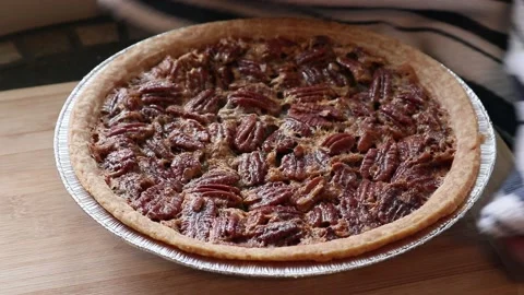 Pecan Pie Placing into Frame Real Time Motion Roasted Nuts Fresh Pie Stock-Footage 145874710