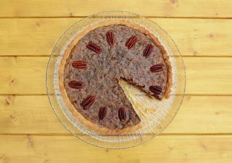 Pecan pie with a slice missing Stock Photos
