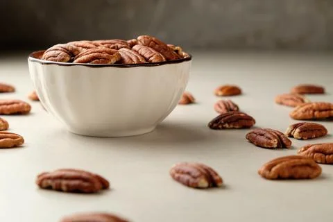 Pecans in a bowl create a rustic and inviting kitchen atmosphere 写真素材