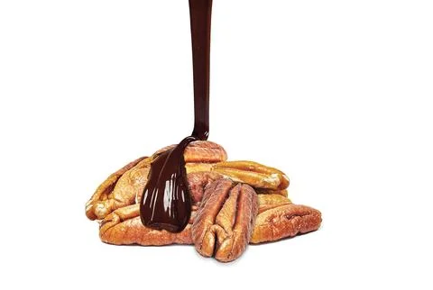 Pecans with chocolate Stock Photos