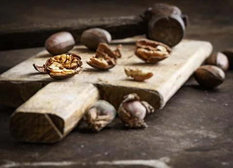 Pecans on a wooden table Stock Photos