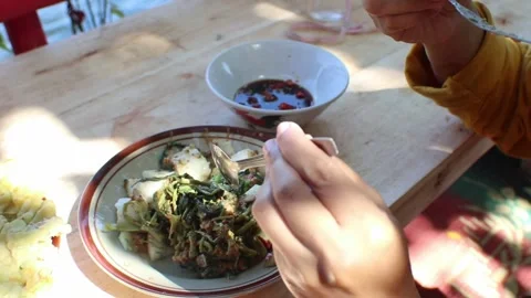 Pecel and Mendoan Tempe Stock Footage 246472304