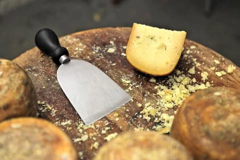 Pecorino cheese on small table. Stock Photos