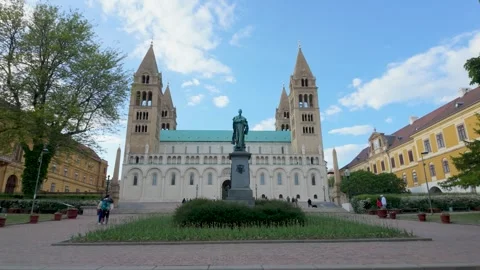 Pecs, Hungary  May 1, 2026: Symmetrical view of Pecs Cathedral with twin towe.. Video stock 336519066